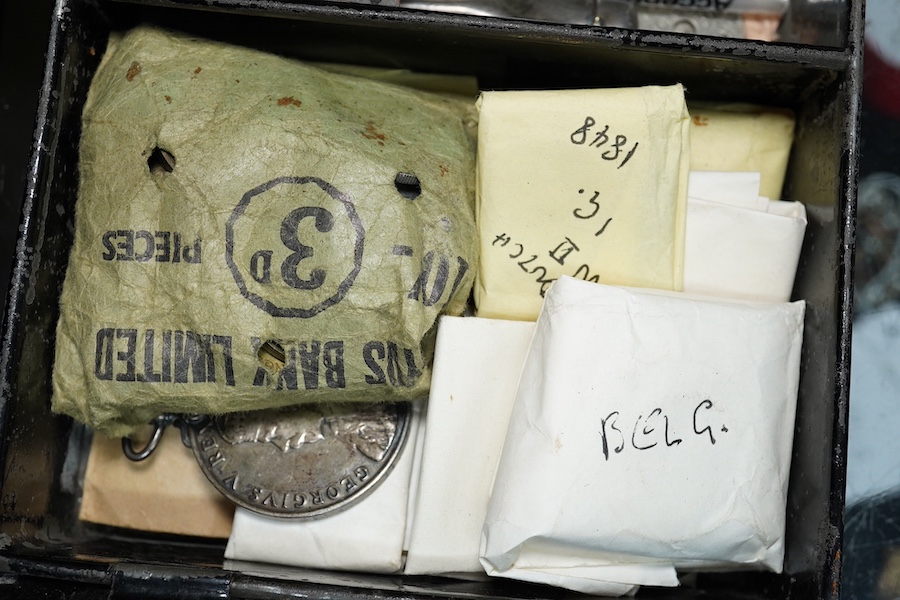 A mixed group of coins and commemorative medals